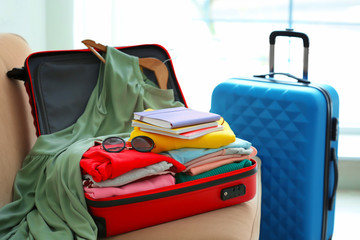 Packed travel suitcases indoors