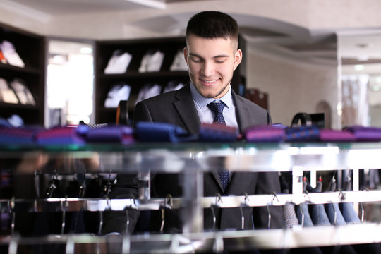 Young man shopping in boutique