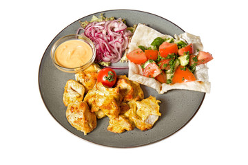 grilled meat with garnish of vegetables
