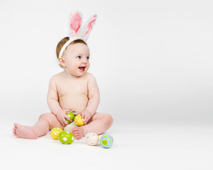 Obraz na płótnie Canvas Baby with bunny ears