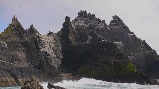 Skellig Michael Island And Waves Crashing On Its Rocky Shore
