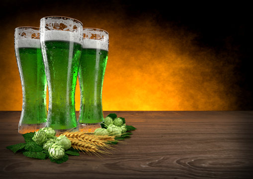 three glasses of green beer with barley and hops. 3D render