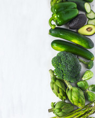Green vegetables  on a white background. Healthy food. Top view
