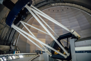 Fototapeta premium Huge modern professional astrophysical telescope under dome of observatory