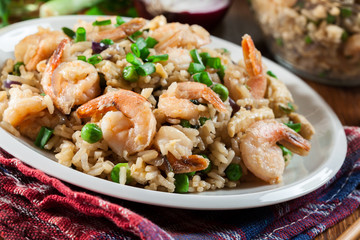 Fried rice with shrimp and vegetables served on a plate