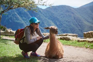 Girl traveller with lama