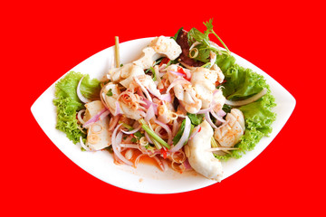 Thai spicy and sour seafood salad on plate