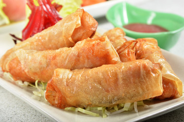 Deep fried seafood roll on plate