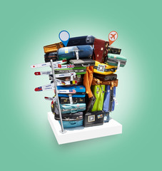Travel concept with many cases bags and travel pointers placed on white base and colored background