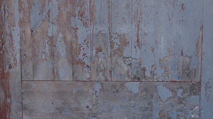 The texture of the gray painted boards.
