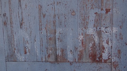The texture of the gray painted boards.