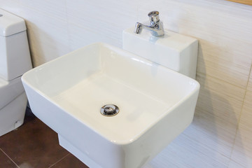 Interior of bathroom with sink basin faucet and mirror. Modern design of bathroom
