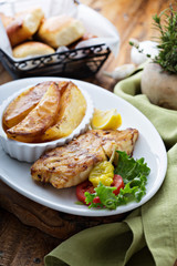 Grilled fish with roasted potatoes