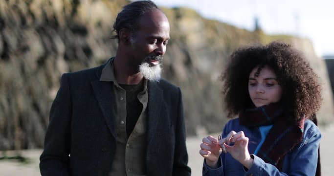 Father and Daughter on beach