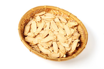 Sliced ginseng in bamboo basket  