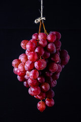 grapes on a black background