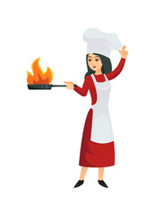 Woman chef in apron standing with frying pan and doing flambe isolated on white.
