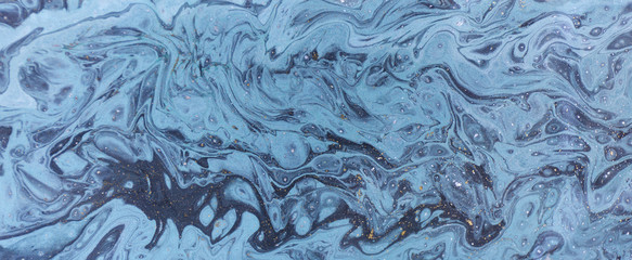 Obraz na płótnie Canvas Marble abstract acrylic background. Nature blue marbling artwork texture. Gold glitter.