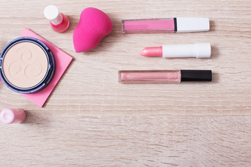 Naklejka premium female pink cosmetics, top view