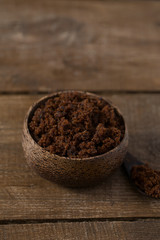 molasses sugar on wooden surface