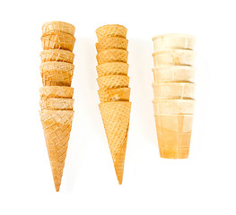 assortment of empty ice cream cones isolated on white
