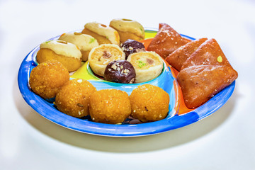 Traditional Bengali Indian sweets dessert made from farmers cheese shot  in selective focus