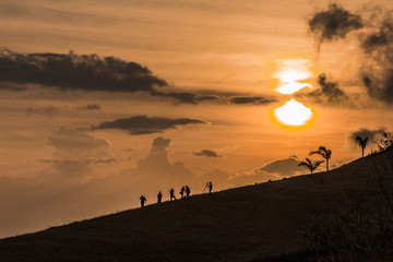 Fototapeta premium Photographers silhouette at the sunset 