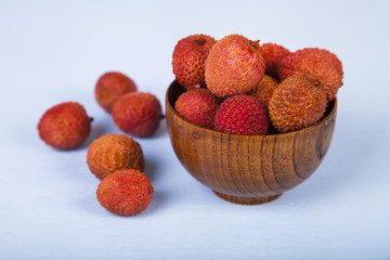 Lychee in a wooden bowl