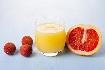 Glass of juice, grapefruit and lychee