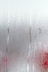Water droplets condensation background of dew on glass window, humidity and foggy blank background....