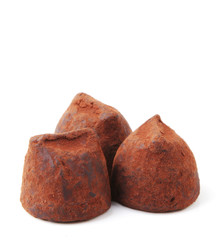 Chocolate truffles on white background