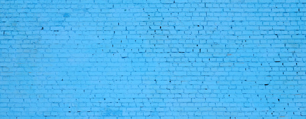 Square brick block wall background and texture. Painted in blue