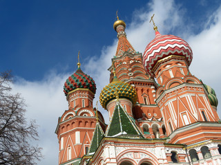 Fototapeta na wymiar Russian landmark on Red Square in Moscow. St. Basil's Cathedral on the background of blue cloudy sky