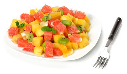 Bowl of healthy citrus fruit salad isolated on white background