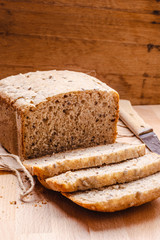 Sliced whole wheat bread on cutting board