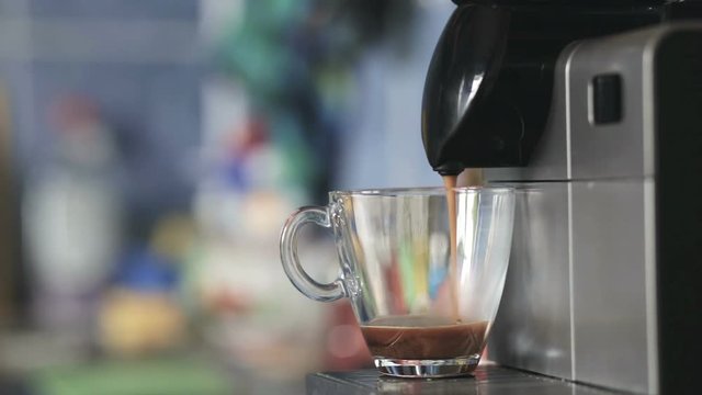 Preparation of natural delicious coffee in the automatic coffee machine good morning