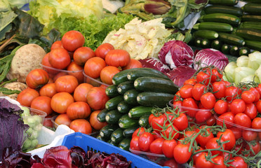 tomatoes courgette .many fruits and more vegetables for sale at market