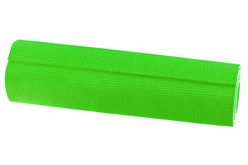 Green yoga mat isolated on white background.