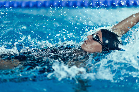 Professional swimmer, swimming race, indoor pool