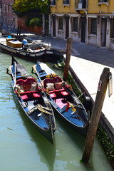Fototapeta na wymiar Water Transport on the Grand Canal, Venice, Italy, including gondolas and vaporettos