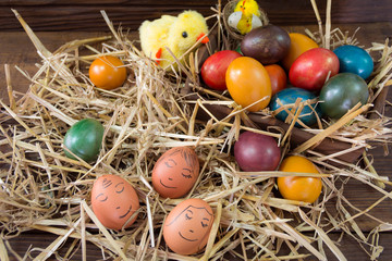 Colorful Easter eggs on wooden background. Easter eggs