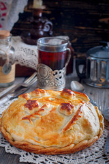 Traditional festive Russian pie - Kournik in Russian style, selective focus, the concept of national food © Анна Журавлева