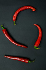Chili pepper, red chili pepper cayenne on black background.
