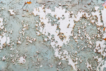 Peeling paint on the wall. Abstract background