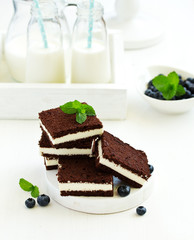 Delicate chocolate creamy cake with raspberries.