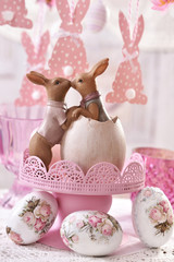 easter table decoration with kissing rabbits figurine