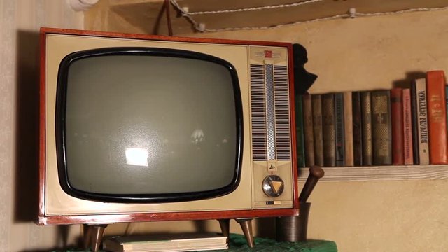 Old TV, retro TV in an old interior. Authentic Old TV