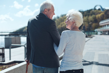 Love you more than yesterday. Charming older couple looking into each other with eyes full of love...