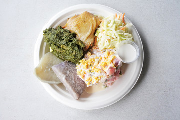 Flat lay view of Cook Island potato salad (Mainese) tradisional dish serve in a plate in Rarotonga, Cook Islands