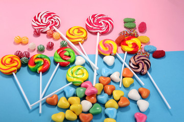 candies with jelly and sugar. colorful array of different childs sweets and treats.